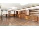 Spacious basement featuring wood flooring, built-in cabinets, and wood trim at 322 Gravley Dr, Rocky Mount, NC 27804