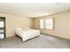 Neutral bedroom with carpet, a queen size bed and natural light from two windows at 322 Gravley Dr, Rocky Mount, NC 27804