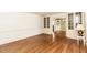 Spacious living room boasting gleaming hardwood floors, built-in cabinets, and a versatile layout at 322 Gravley Dr, Rocky Mount, NC 27804