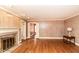 Spacious living room with hardwood floors and fireplace at 322 Gravley Dr, Rocky Mount, NC 27804