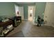 Bedroom with green walls and multiple doorways at 325 Olde Liberty Dr, Youngsville, NC 27596