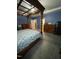 Spacious main bedroom features blue walls, white trim and a decorative canopy bed at 325 Olde Liberty Dr, Youngsville, NC 27596