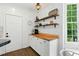 Butler's pantry with wood countertop, white cabinets, and open shelving at 3421 Kistler Ct, Willow Springs, NC 27592