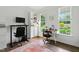Bright office featuring dual desks, shelving, and neutral color scheme at 3421 Kistler Ct, Willow Springs, NC 27592