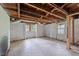Unfinished basement with exposed beams and walls, ready for customization at 4053 Friendship Patterson Mill Road, Burlington, NC 27215