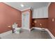 Functional bathroom with a shower and storage cabinet at 4053 Friendship Patterson Mill Road, Burlington, NC 27215