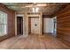 Bedroom featuring unfinished framing and hardwood floors at 4053 Friendship Patterson Mill Road, Burlington, NC 27215
