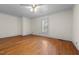 Bright bedroom with a window and hardwood floors at 4053 Friendship Patterson Mill Road, Burlington, NC 27215