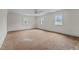 Spacious bedroom with three windows, ceiling fan, and room for customizations at 4053 Friendship Patterson Mill Road, Burlington, NC 27215