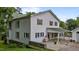 Charming two-story home boasting a classic exterior, green roof, and well-maintained surroundings at 4053 Friendship Patterson Mill Road, Burlington, NC 27215