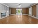 Inviting living room with a fireplace, hardwood floors, and lots of natural light at 4053 Friendship Patterson Mill Road, Burlington, NC 27215
