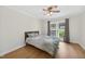 Cozy bedroom with natural light from the window overlooking a green lawn at 4067 Williams Mill Rd, Burlington, NC 27215
