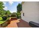 Expansive wooden deck with side of the house, providing ample room for entertaining and relaxation at 4067 Williams Mill Rd, Burlington, NC 27215