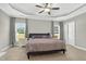 Bedroom with neutral paint, carpet and windows with great natural light at 414 Fallingbrook Dr, Kenly, NC 27542