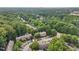 An aerial view of the community surrounded by lush greenery at 4406 Still Pines Dr, Raleigh, NC 27613