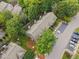 Overhead view of the townhouse complex showing lush landscaping and ample parking at 4406 Still Pines Dr, Raleigh, NC 27613