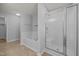Bright bathroom with soaking tub and glass enclosed shower at 4406 Still Pines Dr, Raleigh, NC 27613