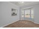 Neutral bedroom featuring a bay window allowing for natural light and plush carpeting at 4406 Still Pines Dr, Raleigh, NC 27613