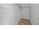 Small walk-in closet with carpet and shelving at 4406 Still Pines Dr, Raleigh, NC 27613
