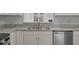 Bright kitchen featuring granite countertops, stainless steel appliances, and white cabinetry at 4406 Still Pines Dr, Raleigh, NC 27613