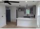 Modern kitchen featuring stainless appliances, pendant lighting, and a breakfast bar at 4511 Denfield St, Durham, NC 27704