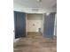 Dedicated laundry closet with double doors and space for appliances, offering convenience and functionality at 4511 Denfield St, Durham, NC 27704