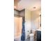 Bright bathroom with a shower/tub, modern vanity, and patterned tile floors at 46 Lakes Edge Ln, Pittsboro, NC 27312