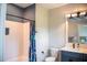 Well-lit bathroom with a shower/tub combination and a modern vanity at 46 Lakes Edge Ln, Pittsboro, NC 27312