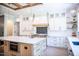 Bright, modern kitchen with stainless steel appliances, custom island, and sleek countertops at 46 Lakes Edge Ln, Pittsboro, NC 27312