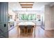 Bright kitchen with a large island, pendant lighting, stainless steel appliances, and open shelving at 46 Lakes Edge Ln, Pittsboro, NC 27312