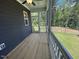 View of new screened in porch overlooking a serene backyard at 502 Yeowell Dr, Chapel Hill, NC 27514