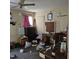 Bedroom with ceiling fan, pink curtains, and natural light at 505 S 15Th St, Erwin, NC 28339