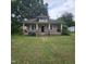 Charming single-Gathering home with a classic front porch and mature trees at 505 S 15Th St, Erwin, NC 28339