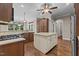 Well-appointed kitchen with granite countertops, stainless steel appliances, and a center island at 512 Belmont Cir, Wake Forest, NC 27587