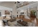 Inviting living room with hardwood floors, high ceilings, staircase and open view of the kitchen at 512 Belmont Cir, Wake Forest, NC 27587