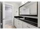 This bathroom features a large vanity, tile floors, and a shower/tub combo at 532 Joe Collins Rd, Lillington, NC 27546
