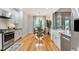 Open floor plan featuring the kitchen, dining room, and hardwood flooring throughout at 532 Joe Collins Rd, Lillington, NC 27546