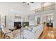 Inviting living room boasts a fireplace, vaulted ceiling, and seamless flow to the dining area at 532 Joe Collins Rd, Lillington, NC 27546