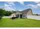Well-maintained backyard with lush lawn, privacy fence and screen porch at 71 Sanibel St, Clayton, NC 27520