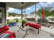 Covered screened porch with comfortable seating, ideal for outdoor enjoyment at 71 Sanibel St, Clayton, NC 27520