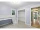A bedroom features a loft bed, built-in shelving, and closet space, offering comfortable living at 7132 Deer Brook St, Willow Springs, NC 27592