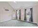 Sunny bedroom with natural light, neutral walls, and ample closet space at 7132 Deer Brook St, Willow Springs, NC 27592