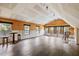 A spacious bonus room with wood floors, natural lighting, and plenty of open space at 7132 Deer Brook St, Willow Springs, NC 27592
