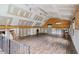 A spacious bonus room with hardwood floors, natural light, offering a versatile area at 7132 Deer Brook St, Willow Springs, NC 27592