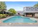 Beautiful backyard pool with an outdoor cabana, bar, and plenty of space for entertaining and relaxing at 7132 Deer Brook St, Willow Springs, NC 27592