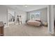 Bedroom with neutral carpet, and decorated ladder against the wall at 81 Dot Ct, Fuquay Varina, NC 27526