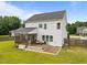 Aerial view of the home's backyard, showcasing the multi-level deck, screened-in porch, and spacious lawn at 81 Dot Ct, Fuquay Varina, NC 27526