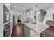 Spacious kitchen with white cabinets, stainless steel appliances, and an open layout at 81 Dot Ct, Fuquay Varina, NC 27526