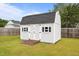 Outdoor backyard shed with double doors, windows and a ramp for easy access and storage at 81 Dot Ct, Fuquay Varina, NC 27526