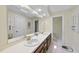 Bathroom with double sinks, vanity, and a bright and clean design at 821 Ascot Ln, Raleigh, NC 27615